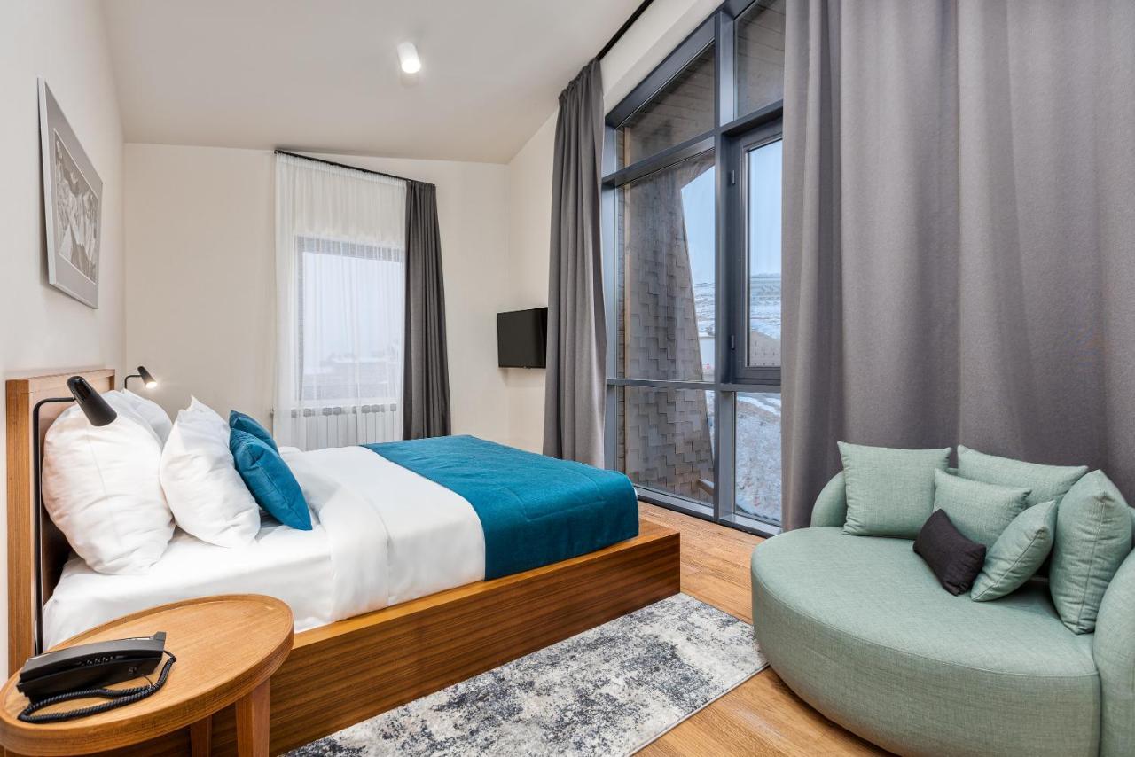 Gudauri Lodge ภายนอก รูปภาพ A bedroom at the hotel